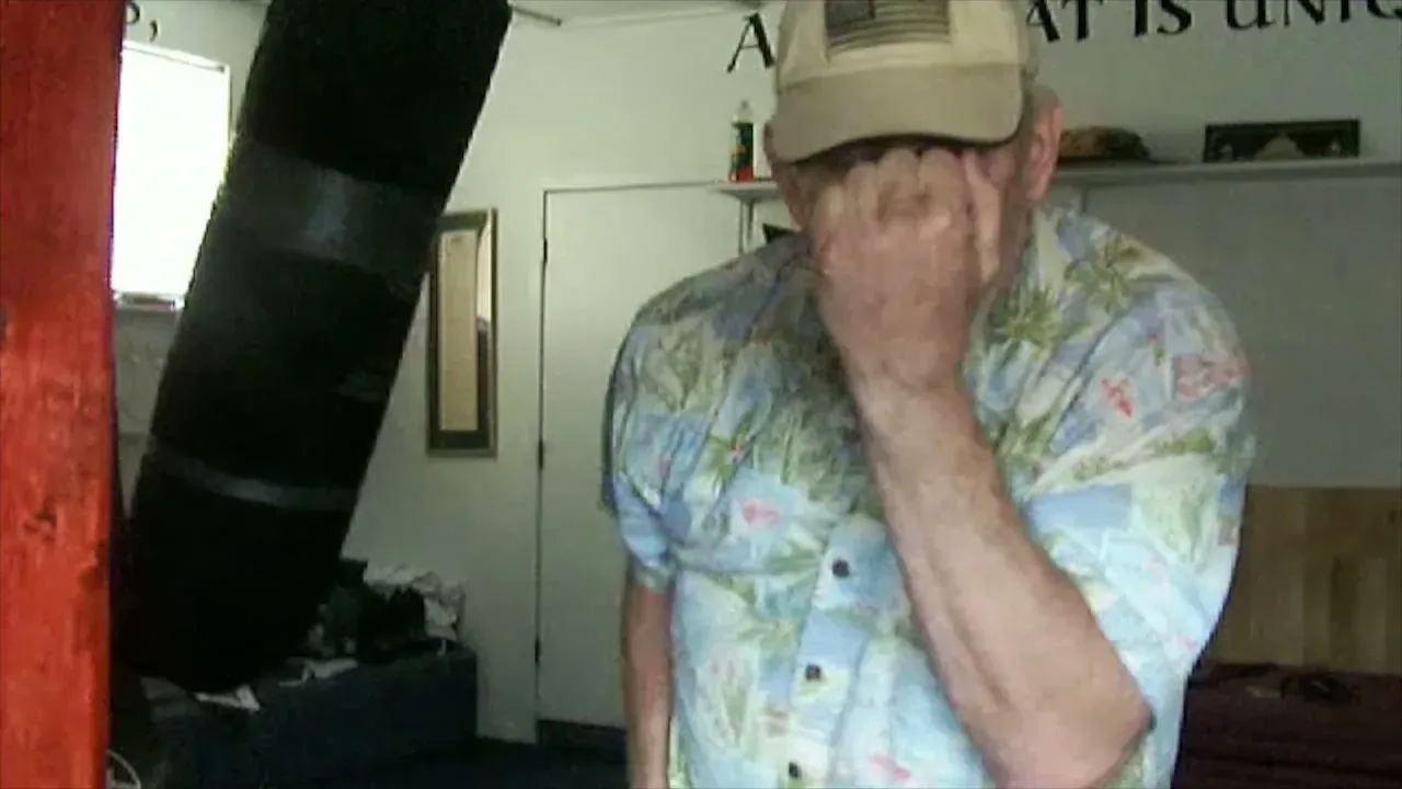John Blee demonstrating a defensive cover