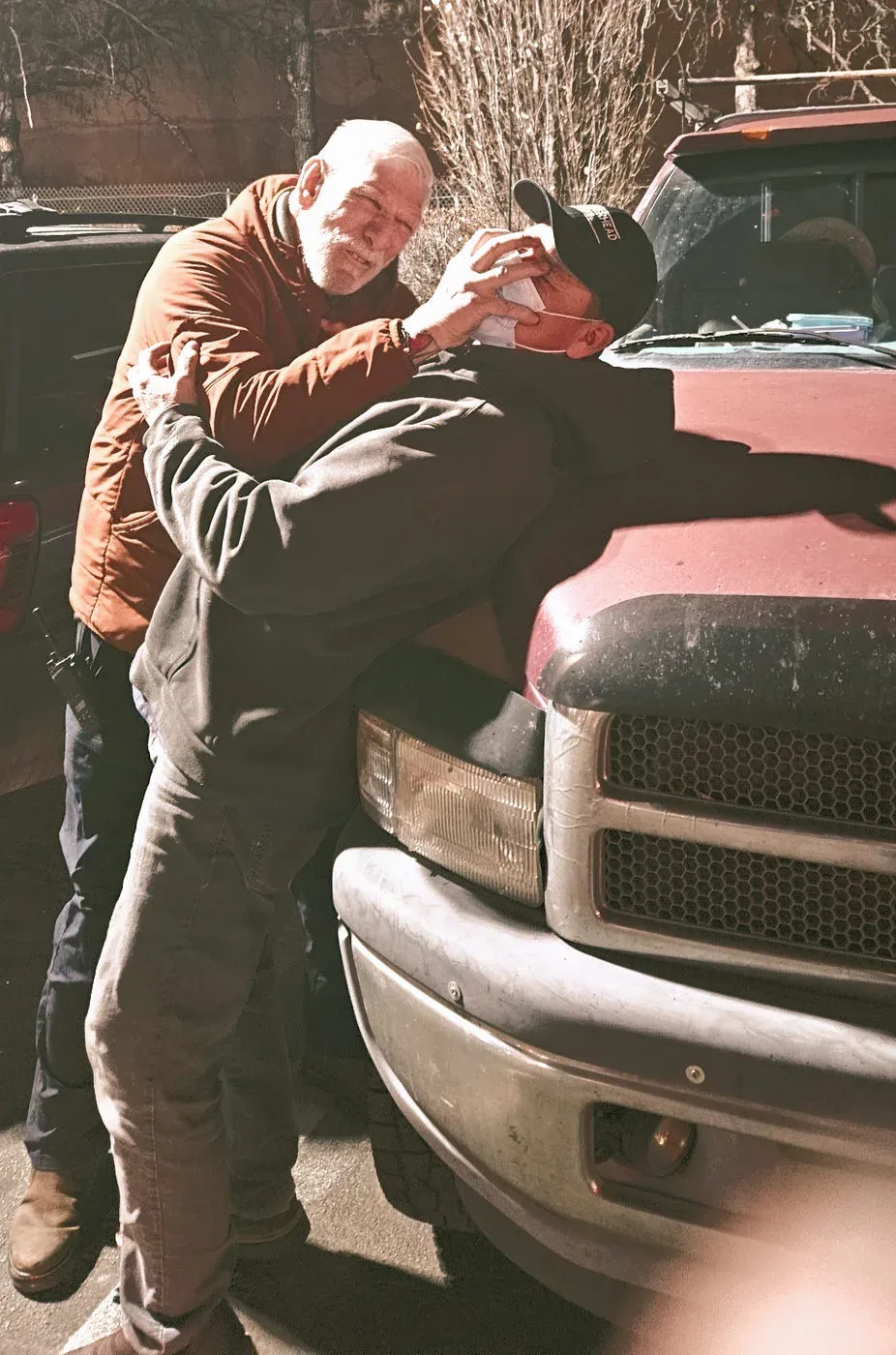 John Blee demonstrating a hold against a truck during a real-world scenario drill
